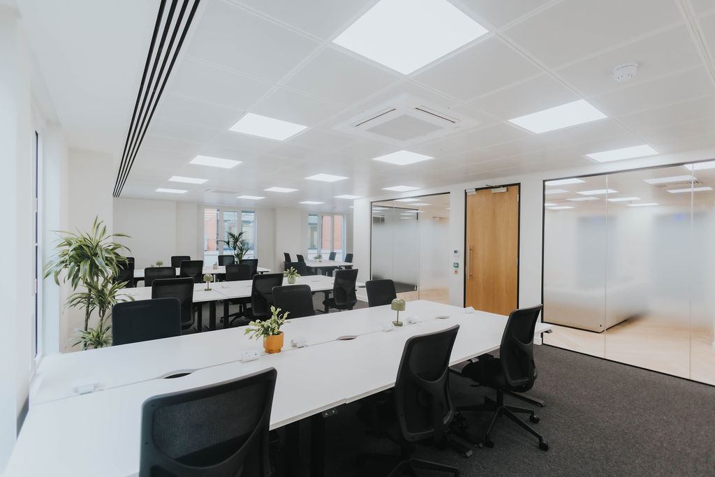 Private office with white desks and glass meeting rooms at Vallist Finlaison House, Holborn